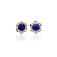 Blue Sapphire Cabochon with White Topaz Floral Studs